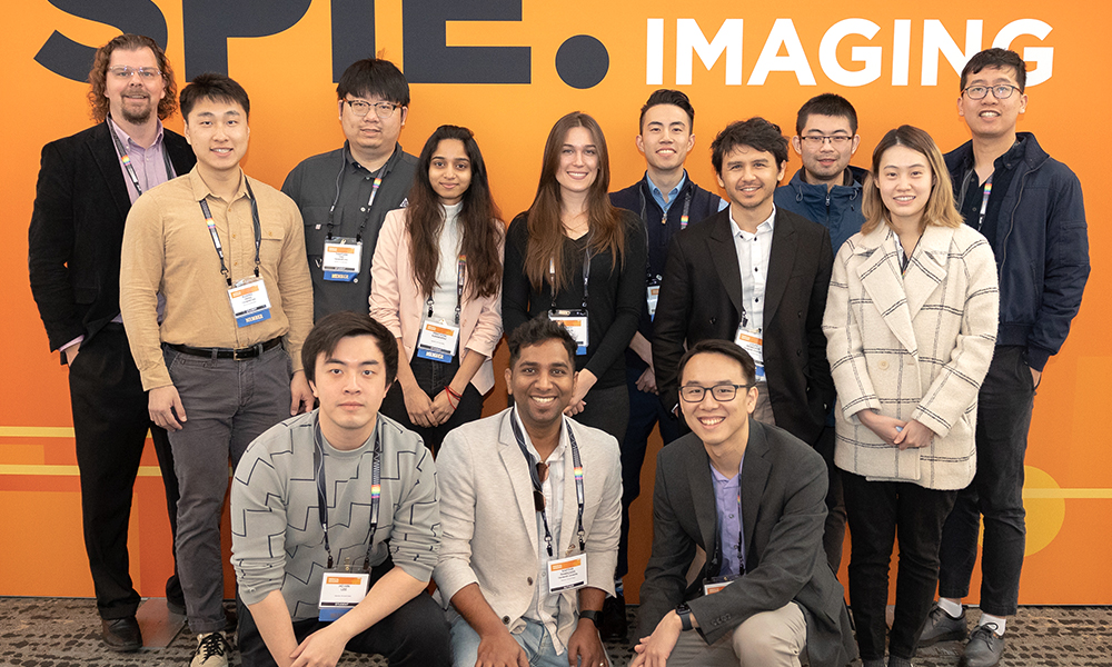 Luncheon presenter and attendees at a networking and social event at SPIE Medical Imaging