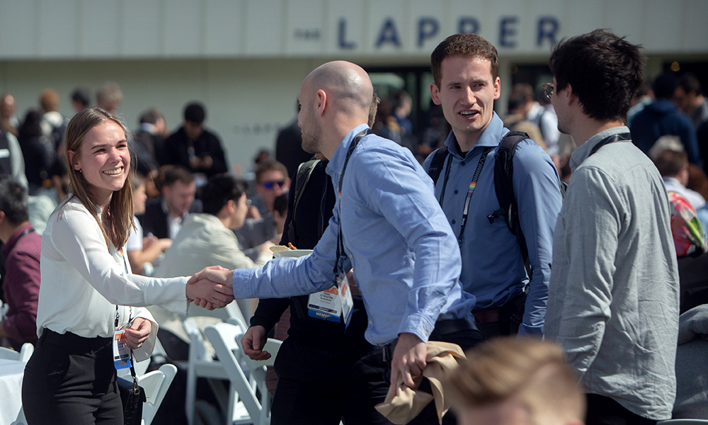 Attendees connecting with colleagues at SPIE Medical Imaging 