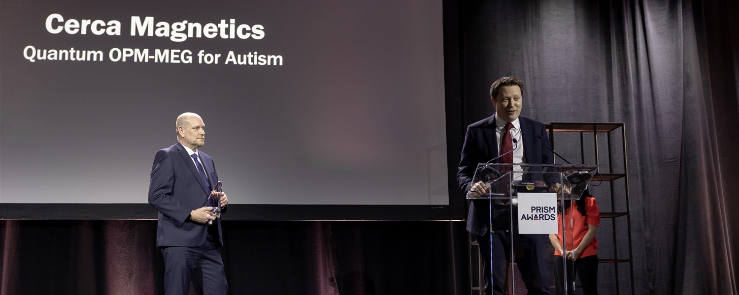 erca Magnetics receiving the PRISM Awards Catalyst Award for the Quantum OPM‑MEG for Autism on stage