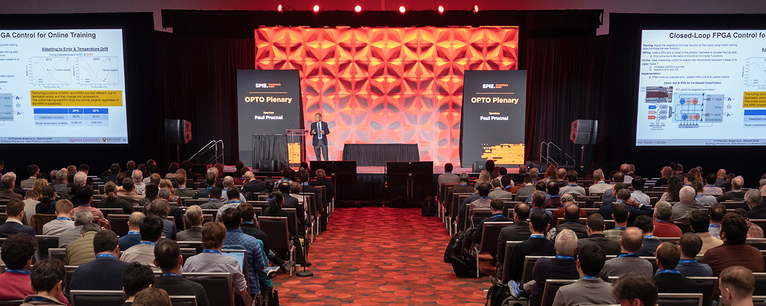 A full room for main stage at Photonics West, showcasing plenary speakers