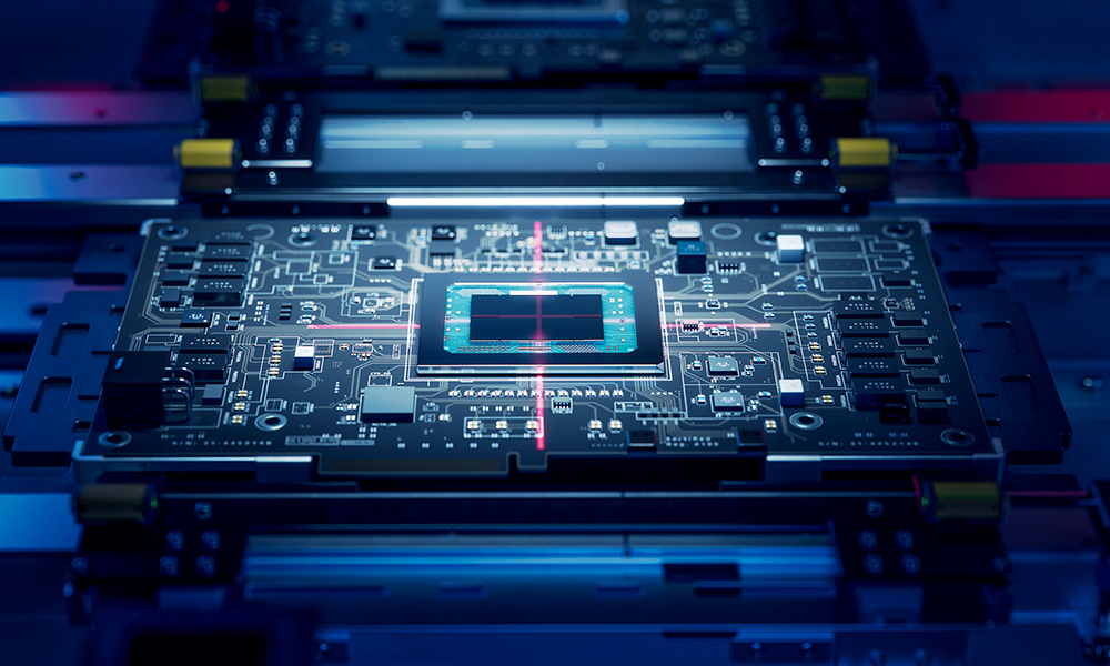 A close-up view of a computer chip on a circuit board, illuminated by blue and pink lights, with intricate electronic components and pathways visible in high detail.