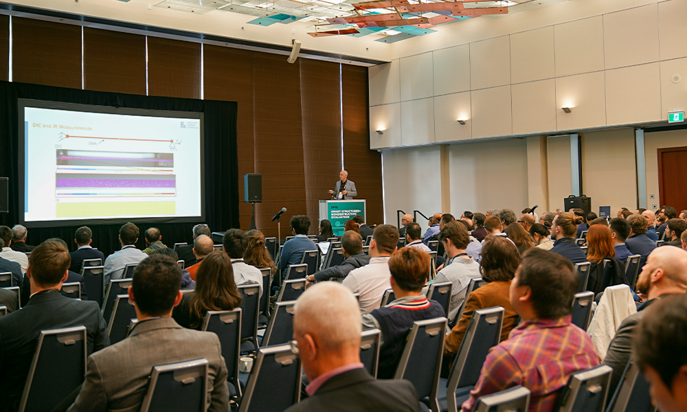 Attendees at past SPIE Smart Structures + NDE event