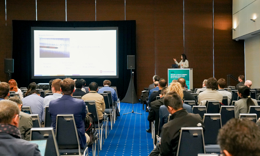 Participant sharing research at SPIE Smart Structures + NDE