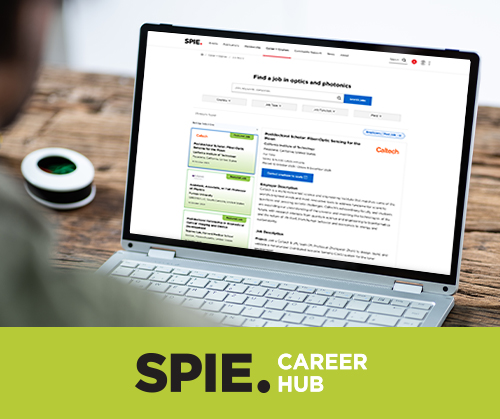 A person is viewing a laptop screen displaying the SPIE Career Hub website, which lists job opportunities in optics and photonics. The page shows job postings with details such as titles and descriptions. At the bottom of the image, there is a green banner with the text “SPIE. CAREER HUB” in bold white and black letters.