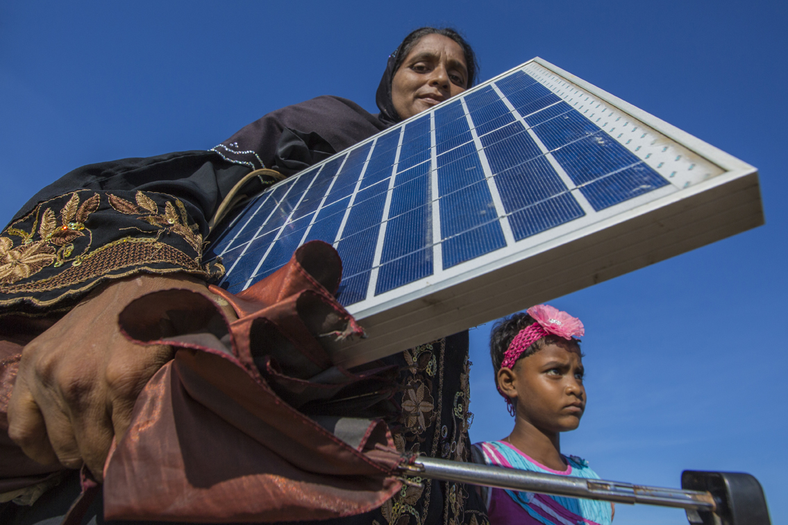Refugee with solar panel